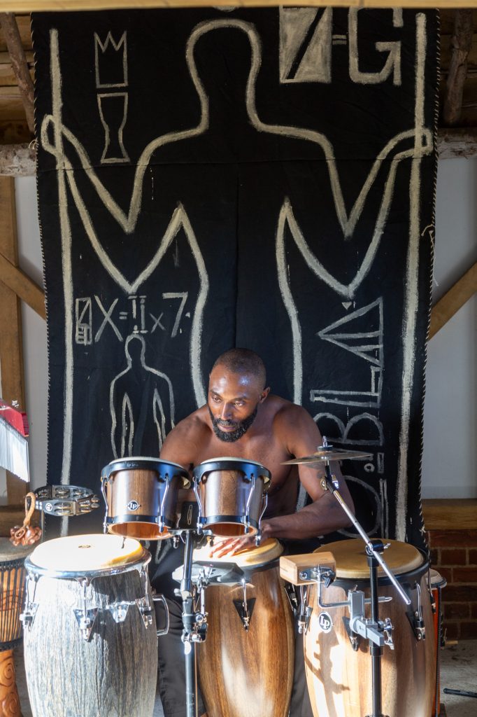 Irvin Pascal playing drums